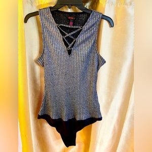 Size Large. Polyester.Rayon. Metallic. Spandex. Slightly worn.